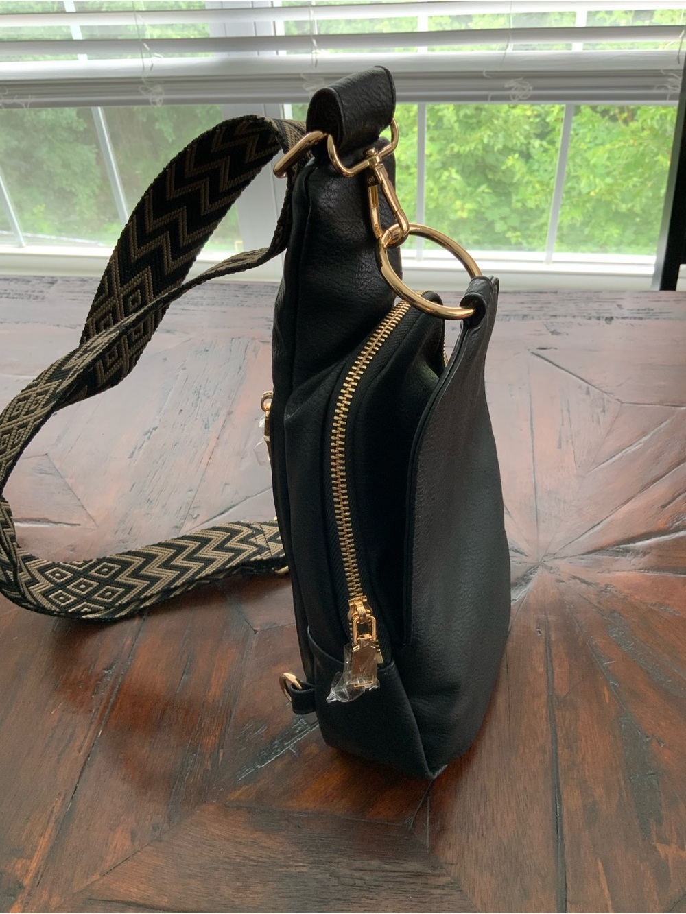 Moda Luxe Black Sling Bag with Patterned Chevron Strap - Picture 7 of 7